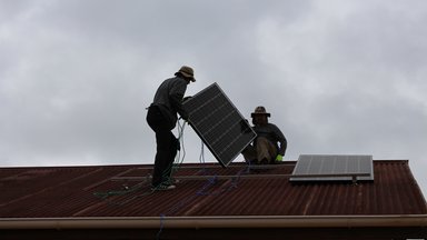 Solar Panel Being Installed on Roof