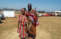 Kirby and his host mother in traditional attire at their chief's installation ceremony.