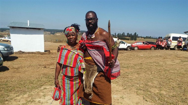 Kirby and his host mother in traditional attire at their chief's installation ceremony.