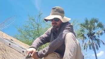 Thumbnail for Instagram image of Botswana Response Volunteer Thatching a Roof