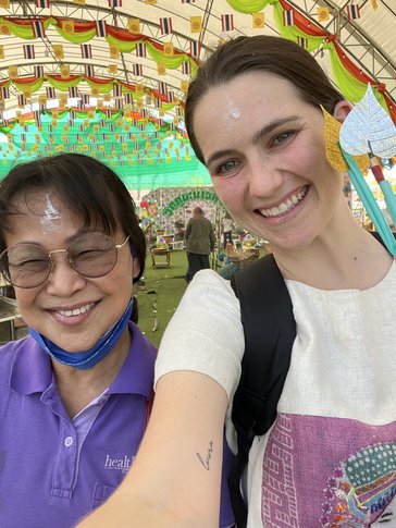Kayla and her host mom celebrate the new year in Thailand by making merit at a local temple.