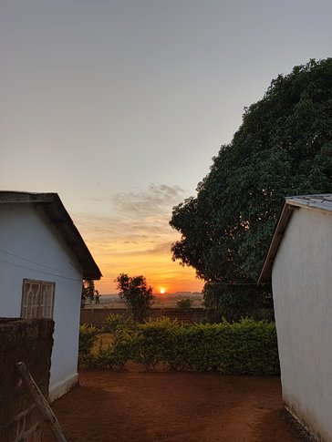 Jesse enjoys watching the sunset from his home in Cameroon.