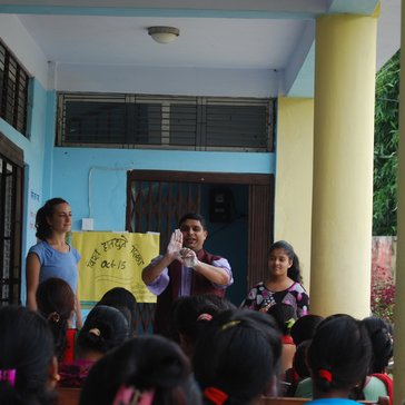 Doing a handwashing demonstration with Jhabindra