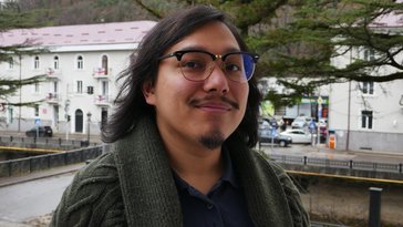 Person smiling at the camera.