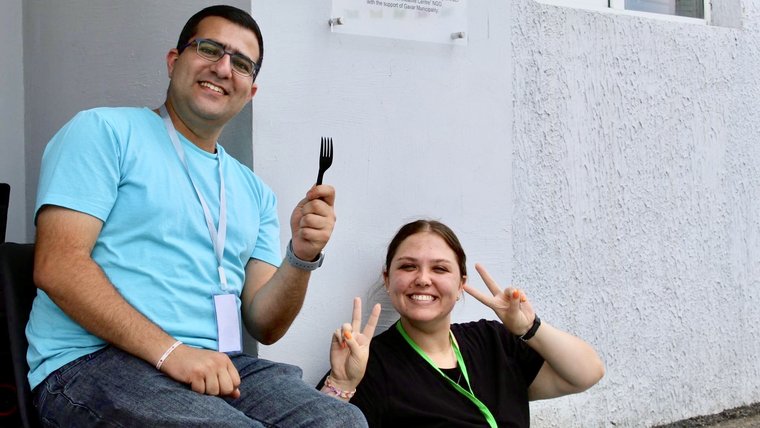 Kaitlyn with her counterpart Gevorg at a youth camp they led in Armenia.