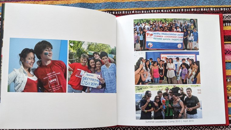 Photos in a book depict the NGO that a former Peace Corps Volunteer and some young woman co-founded.