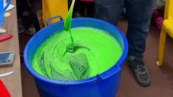 Kyle Making Soap in Uganda