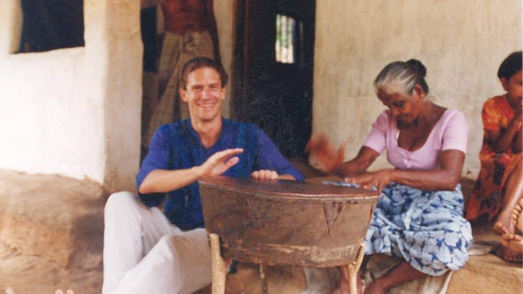 Learning to beat the drum beat from a village veteran drummer