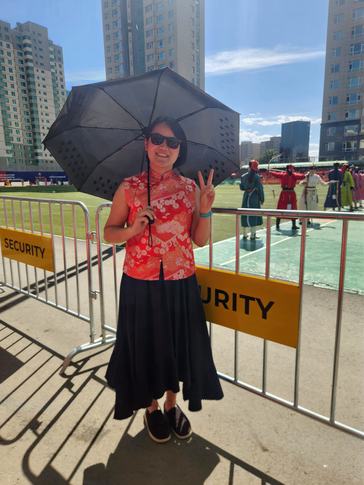Linh attends Naadam, a summer festival celebrating wrestling, horse racing, and archery.