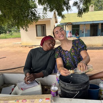 Liora with her counterpart, Mama L., teach soapmaking to mothers at the local clinic.