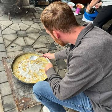 Logan makes Flia, a traditional Albanian dish with his host family