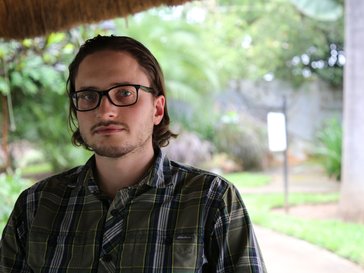 Male volunteer with glasses.