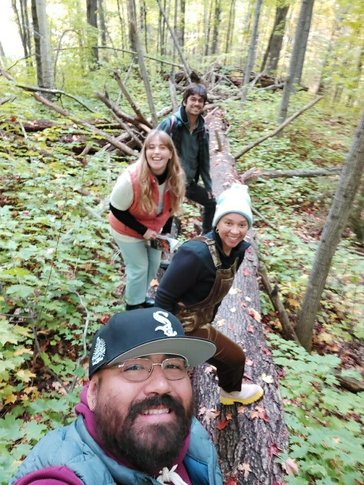 Sierra looks for mushrooms with friends