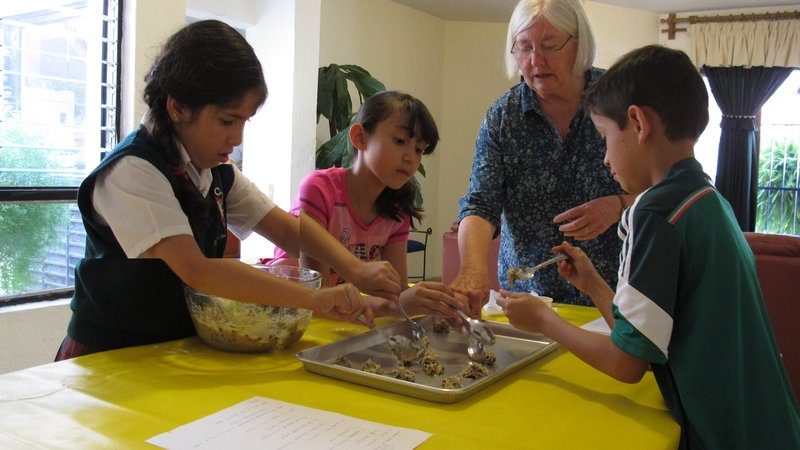 Mary incorporates an English lesson into a chocolate chip cookie baking activity.