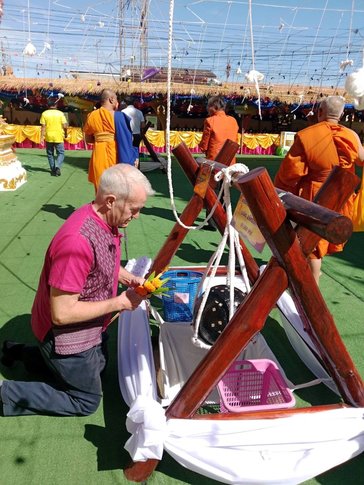 Making merit is an important part of Thai Buddhism.