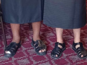 Two pairs of locally purchased men's professional Fijian shoes