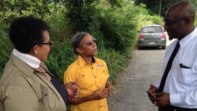 Mickie meeting with her counterpart and school principal on the road in Jamaica (2016-17)