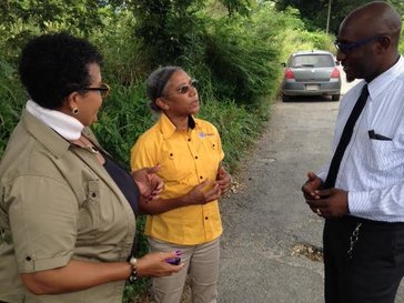 Mickie meeting with her counterpart and school principal on the road in Jamaica (2016-17)