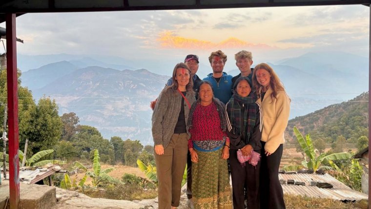 Michael with host family and American family.