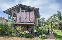 A wooden house on stilts in Panama