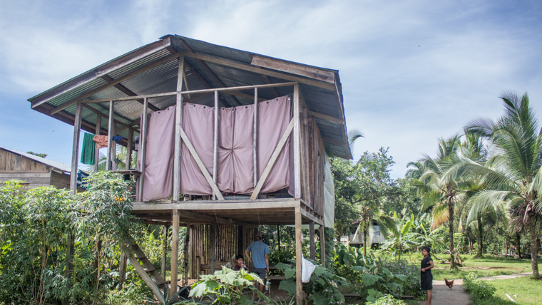 A wooden house on stilts in Panama