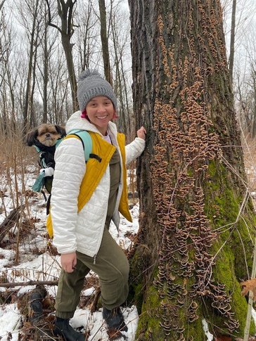 Sierra looks for mushrooms with her dog