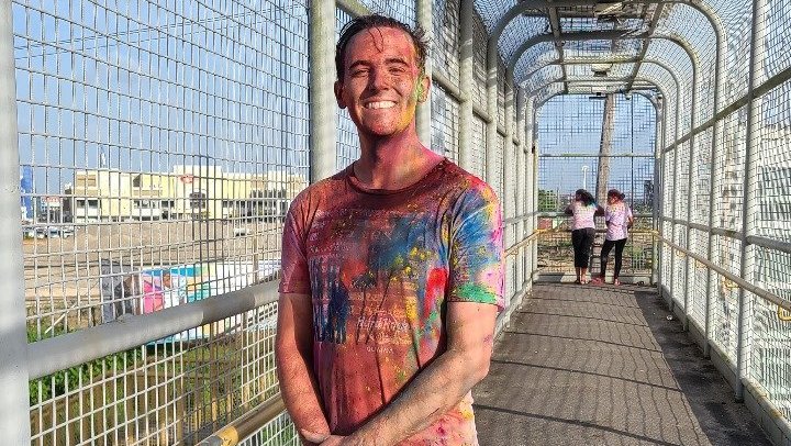 Nicholas S enjoys the Holi festival of colors