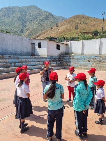 Naomi leads a game to celebrate the International Day for the Right to Play.