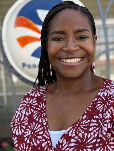 A picture of Country Director, Tamu Daniel to be included in her welcome address