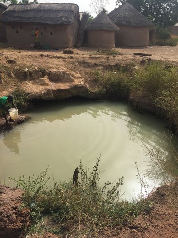 Children collect water for cooking, drinking and bathing from a local river.