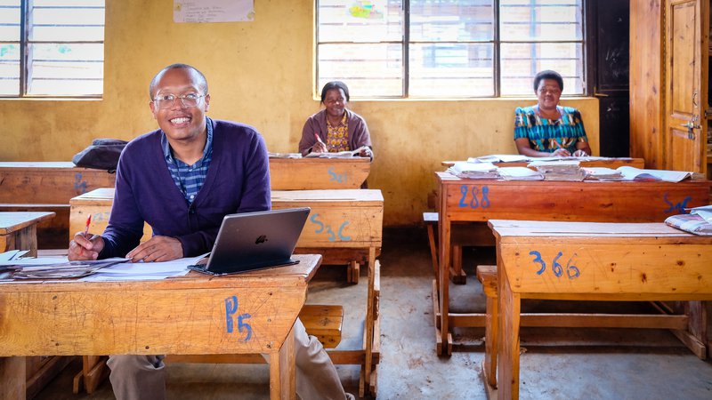 Image: (left to right) Education Volunteer Nile, English teacher Rose, math teacher Valintine