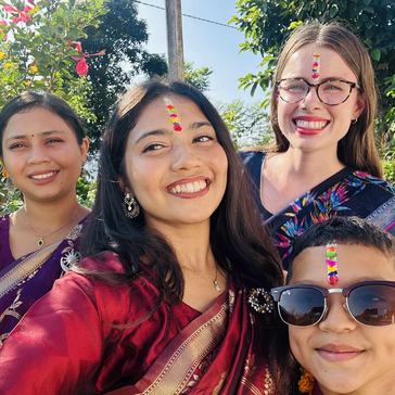 Shay participates in Bhai Tika as part of the holiday Tihar with her host family.