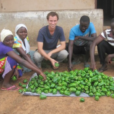 Peace Corps Volunteers Genevieve James and Ryan Ott introduced green peppers for the first time to a village in Ghana.