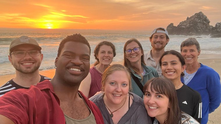 Thomas and fellow Volunteers enjoy a Peruvian beach at sunset.