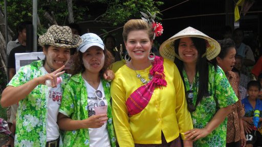 Sarah Brooks in Thailand with three people