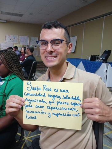 William and his local project partner help develop a vision statement for their community.