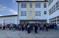 students gathered in school yard