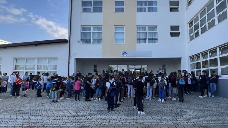 students gathered in school yard