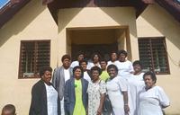 women in front of building