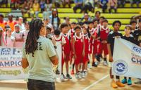 teacher speaking to student atheletes
