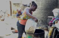women working with palm oil