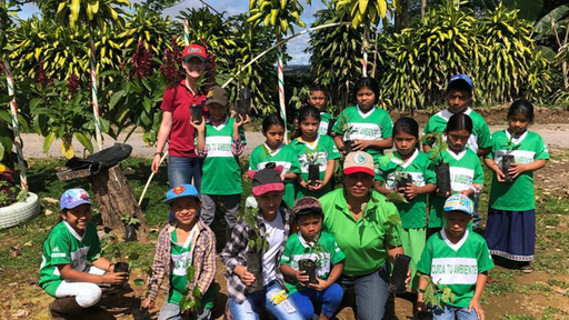Students from the community in a reforestation project