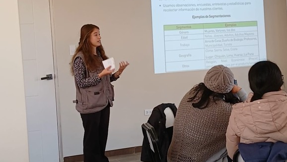 Emily conducts an entrepreneurship workshop with women in Peru.