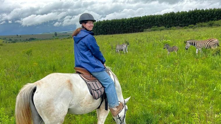 Chloe sees zebras at a game reserve in Eswatini.