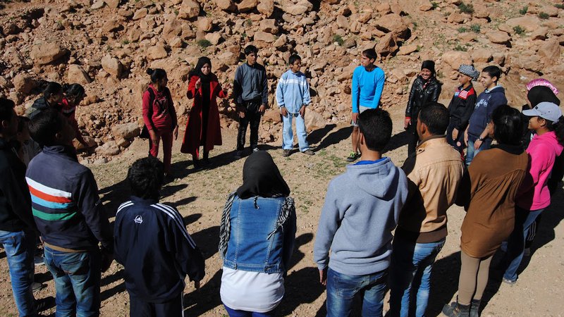 People stand in a circle in Morocco