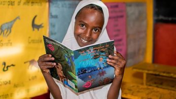 Ugandan girl reading