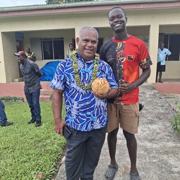 Branden and the current prime minister of Vanuatu after a local meeting at the area headquarters in Vanuatu.