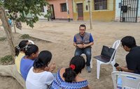 Bryan Ramirez, Water, Sanitation, and Hygiene Volunteer in Peru, facilitating a workshop.