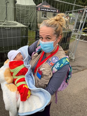 Erin holding a baby