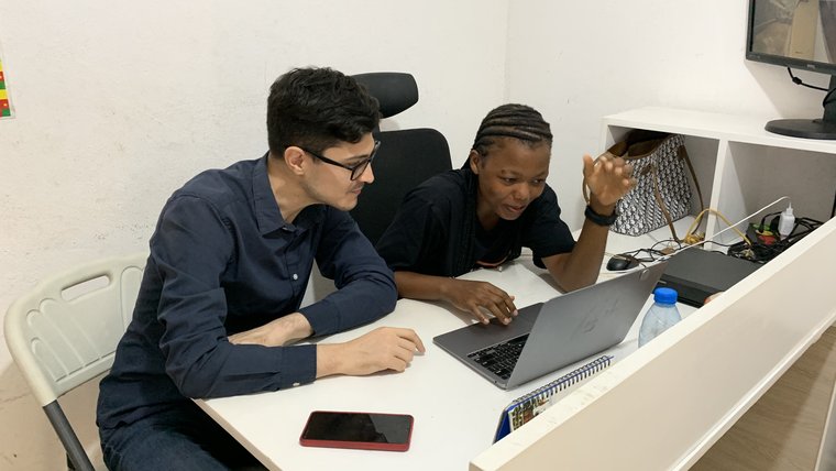 Ryan at work with Iknite program coordinator in Cameroon.